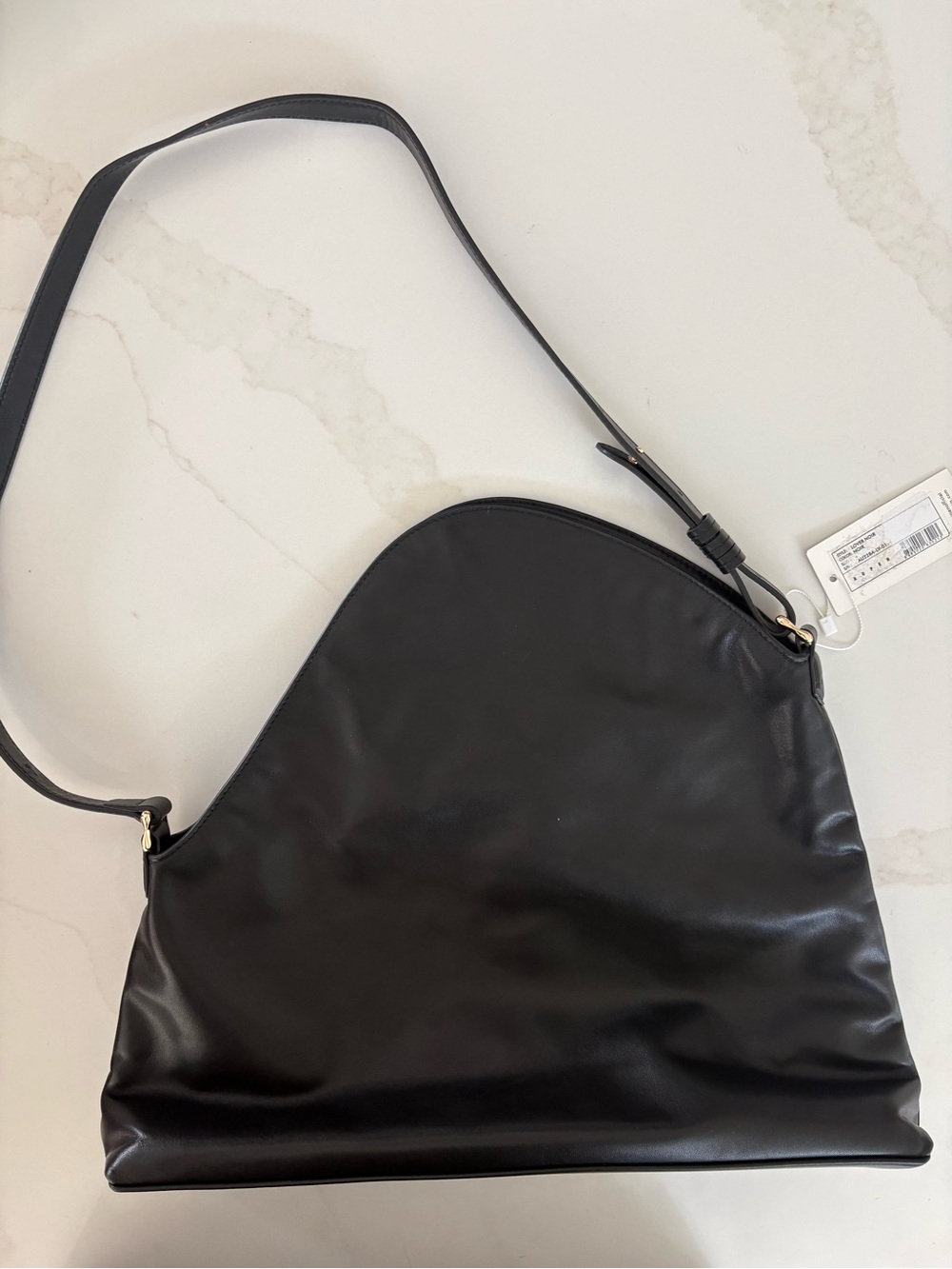Aupen Sleek Black Shoulder Bag with Curved Silhouette